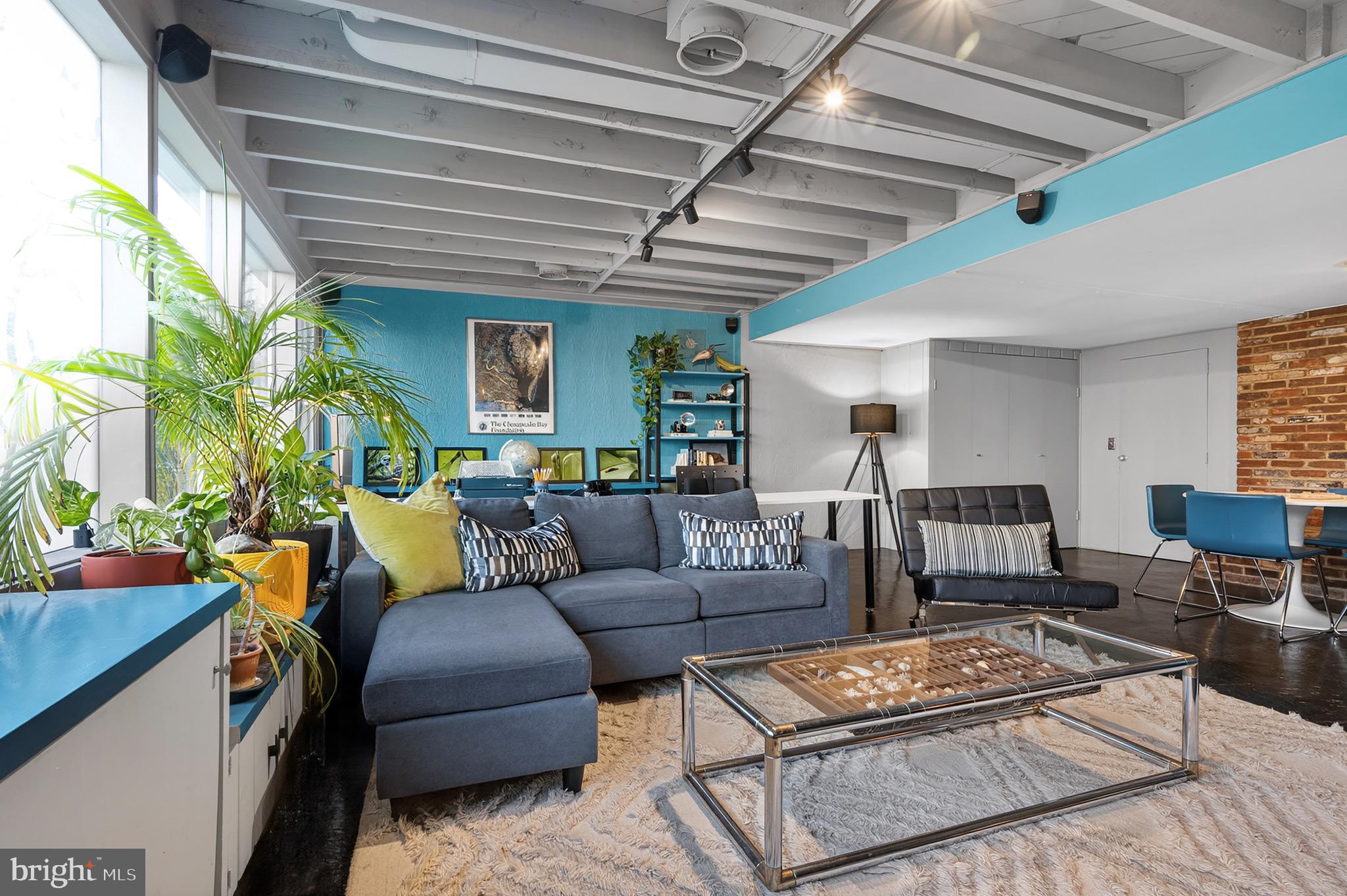 2205 Paul Spring Road Alexandria, VA 22307 - Photo 57 of 131 a living room with furniture and a wooden floor
