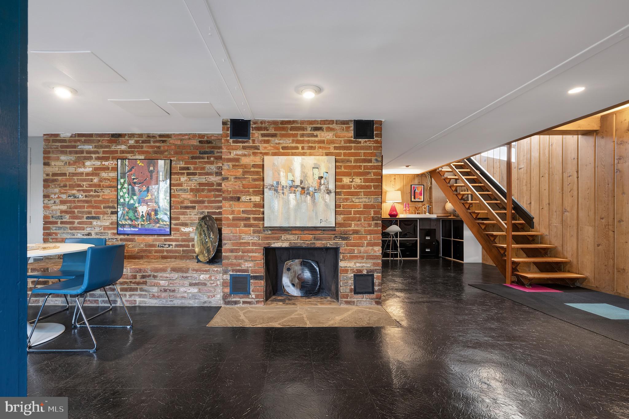 2205 Paul Spring Road Alexandria, VA 22307 - Photo 62 of 131 a living room with furniture fireplace and wooden floor