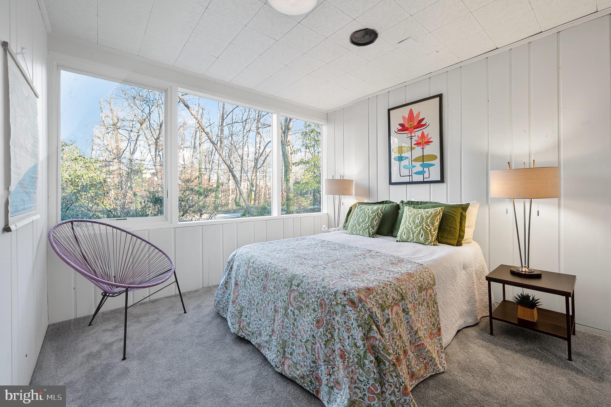 2205 Paul Spring Road Alexandria, VA 22307 - Photo 63 of 131 a bedroom with a bed a couch and a window