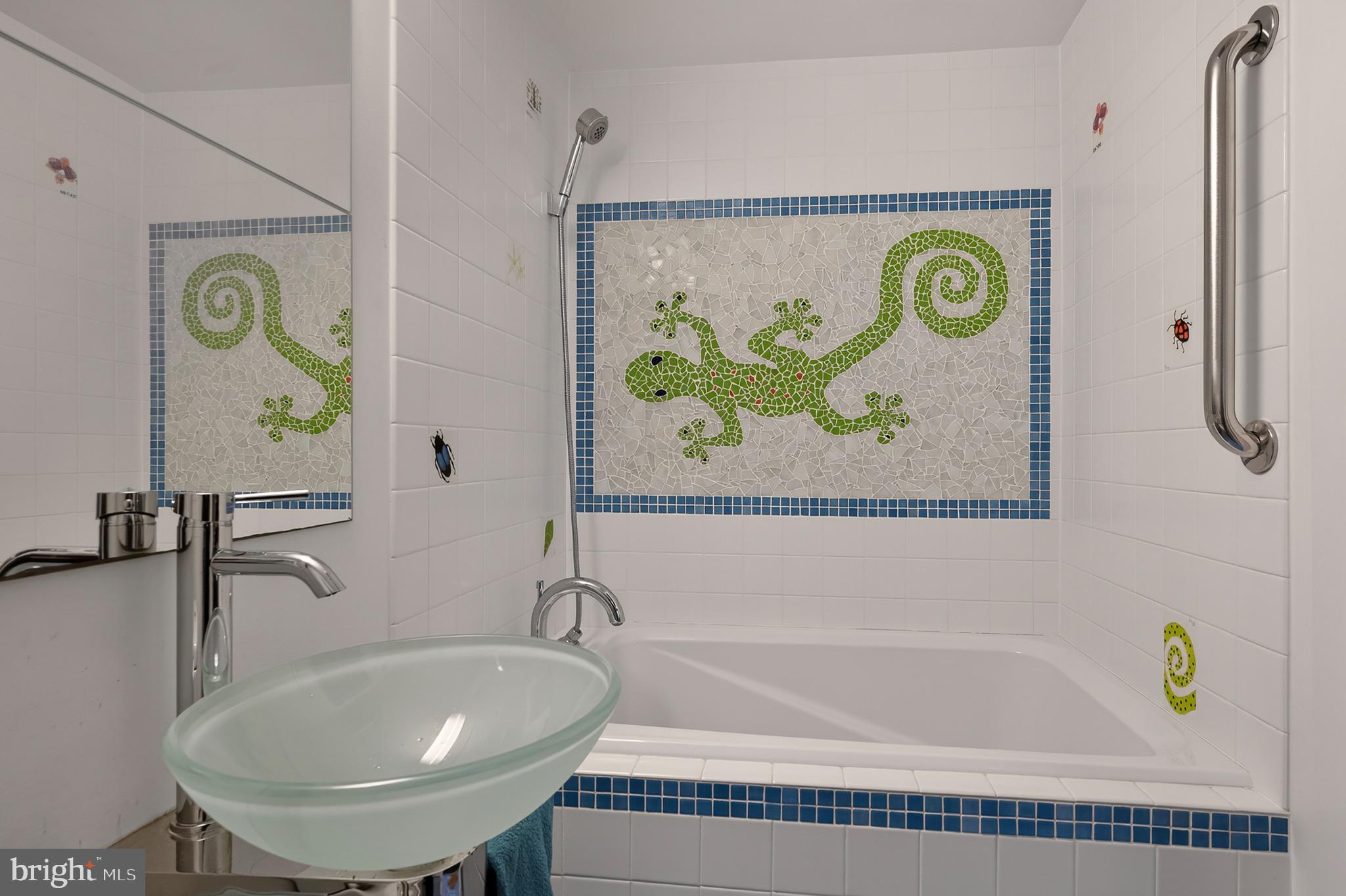 2205 Paul Spring Road Alexandria, VA 22307 - Photo 66 of 131 a bathroom with a sink a bathtub and a shower