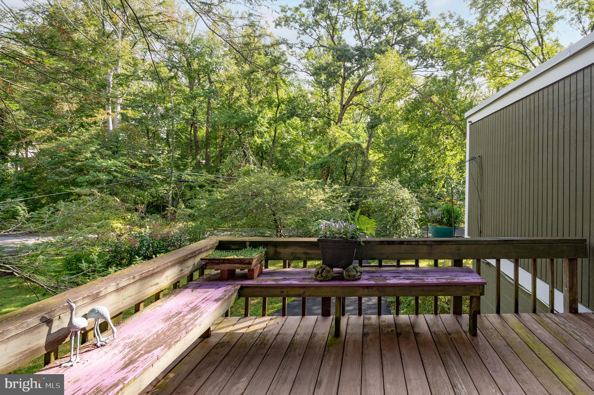 2205 Paul Spring Road Alexandria, VA 22307 - Photo 71 of 131 a view of a roof deck with wooden floor and fence