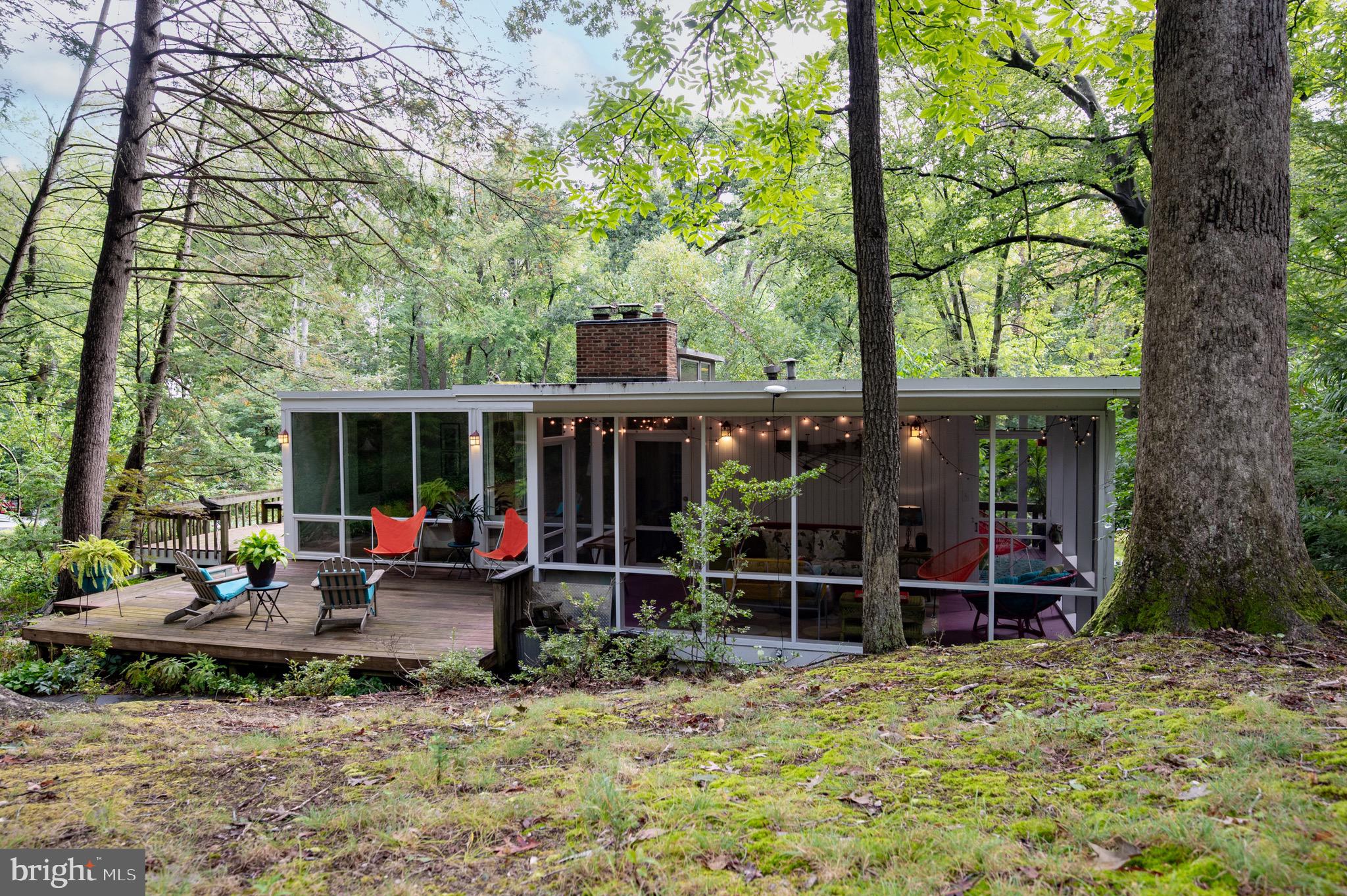 2205 Paul Spring Road Alexandria, VA 22307 - Photo 78 of 131 a view of a house with backyard porch and sitting area
