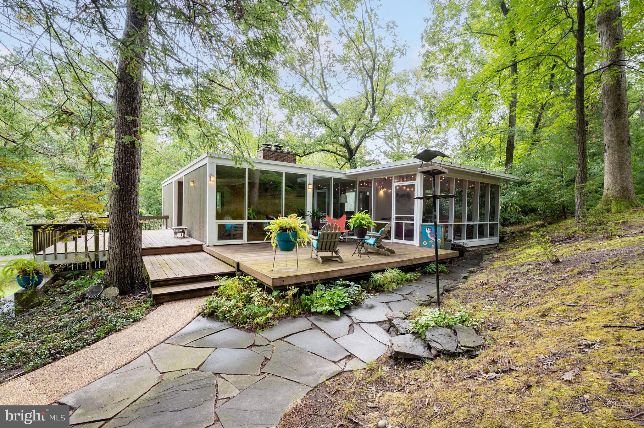 2205 Paul Spring Road Alexandria, VA 22307 - Photo 79 of 131 a view of a house with backyard sitting area and garden