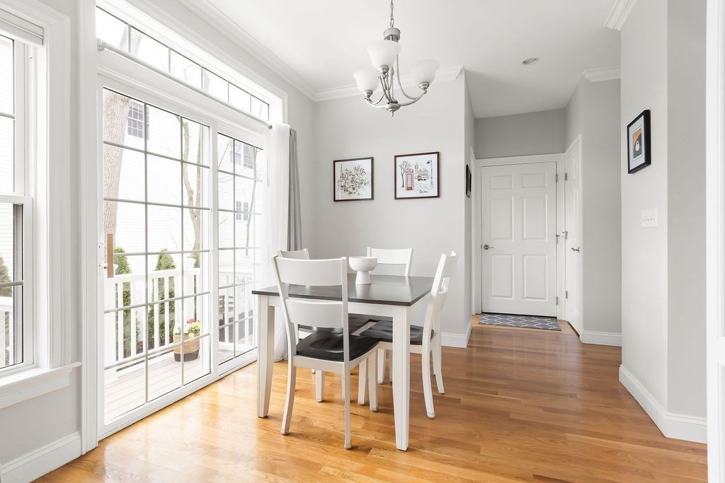 7 Maple Place Needham, MA 02492 - Photo 8 of 26 a view of a dining room with furniture and wooden floor