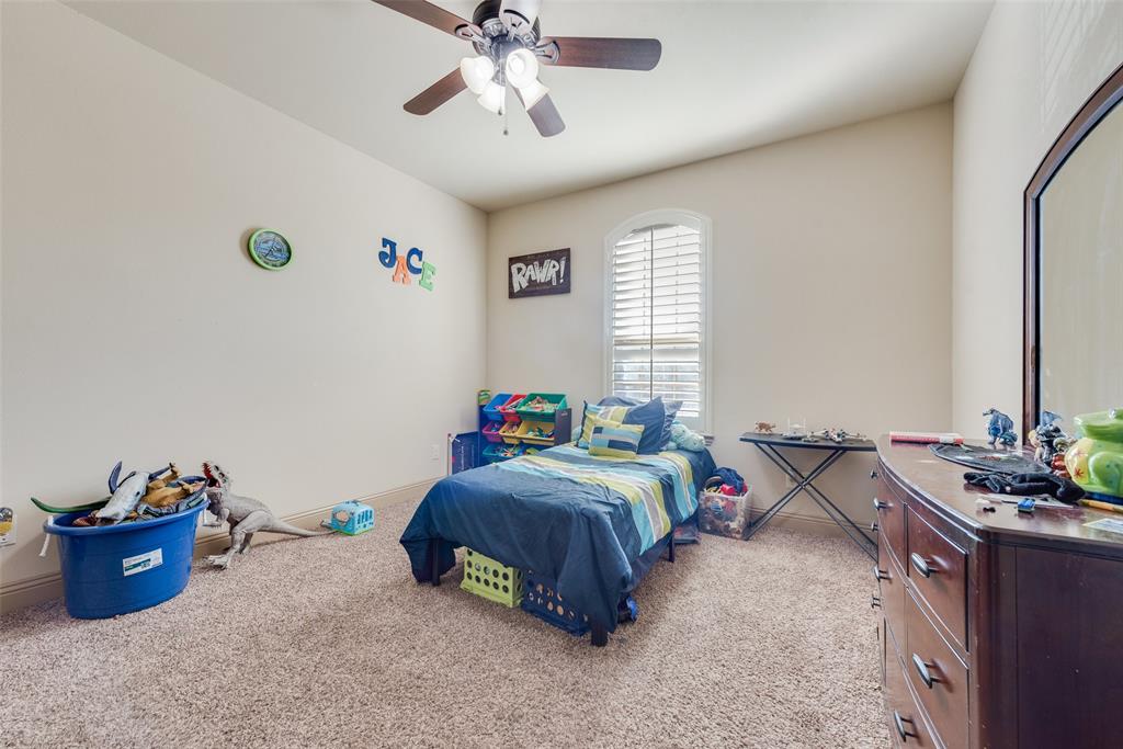 5056 Empire Way Irving, TX 75038 - Photo 30 of 39 Bedroom #6 with carpet and ceiling fan