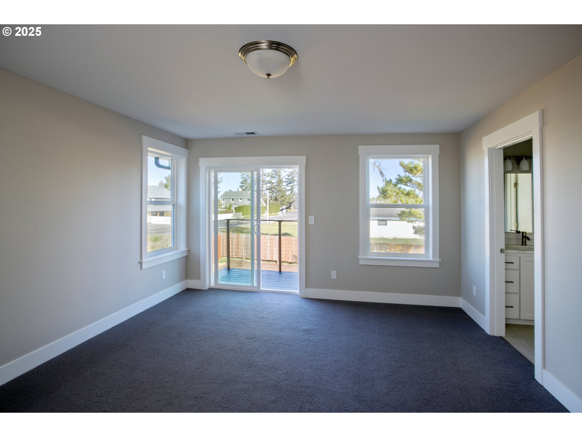 790 17th Avenue Seaside, OR 97138 - Photo 14 of 29 a view of an empty room with a window