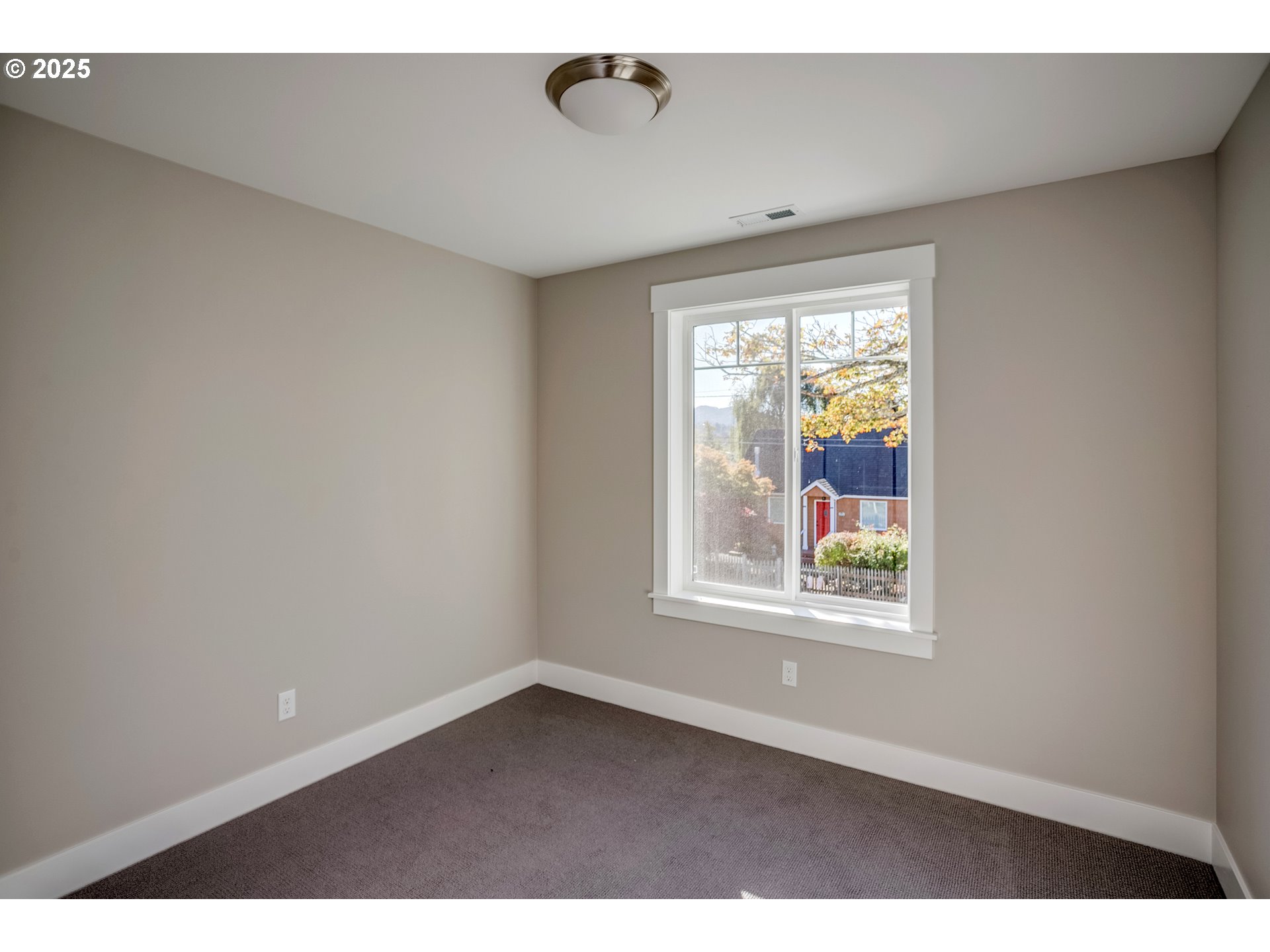 790 17th Avenue Seaside, OR 97138 - Photo 19 of 29 an empty room with a window