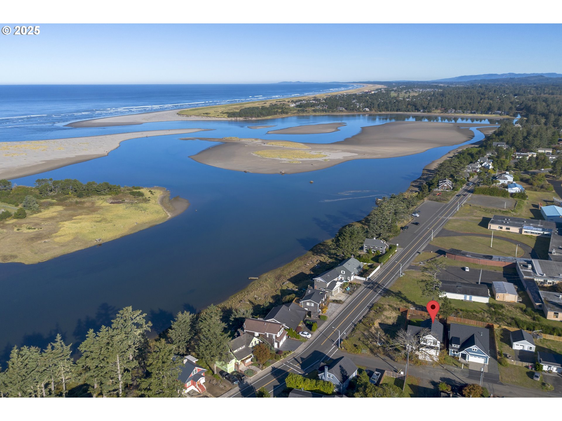 790 17th Avenue Seaside, OR 97138 - Photo 28 of 29 an aerial view of residential houses with outdoor space