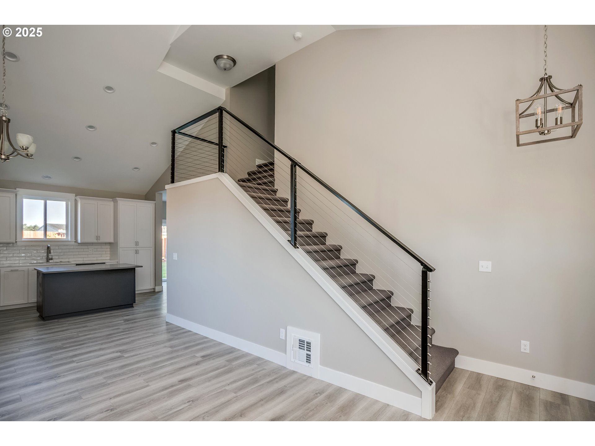 790 17th Avenue Seaside, OR 97138 - Photo 7 of 29 a view of an entryway with wooden floor