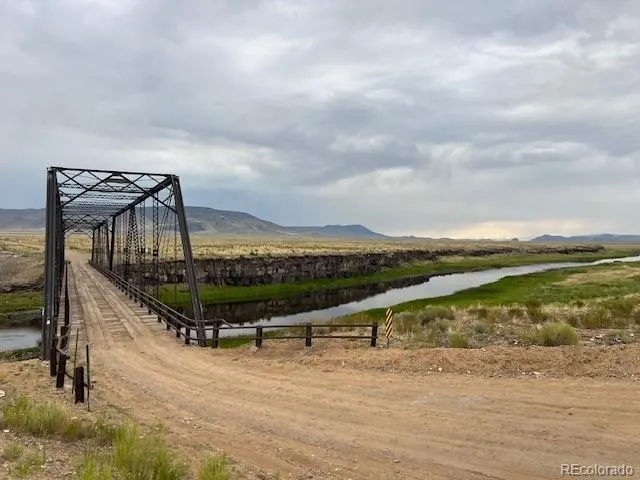 a view of a lake with a big yard
