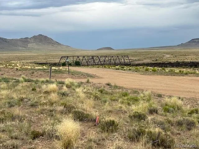 a view of a lake with a mountain in the background