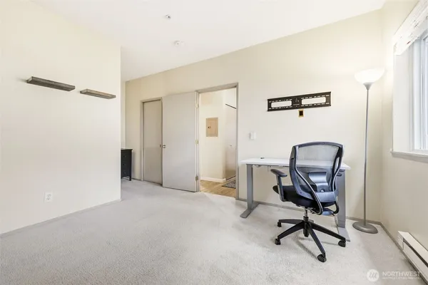 a view of a workspace with furniture