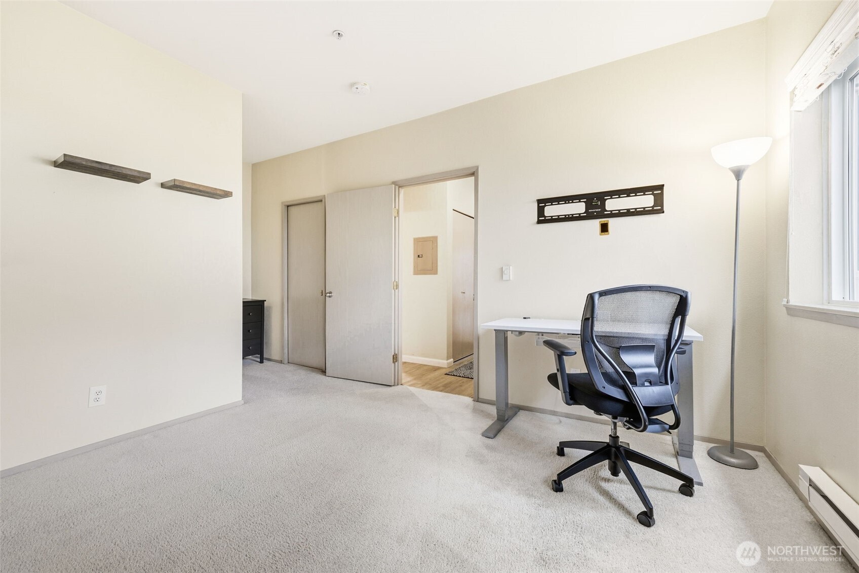 3914 243rd Place Southeast, Unit L301 Bothell, WA 98021 - Photo 11 of 19 a view of a workspace with furniture