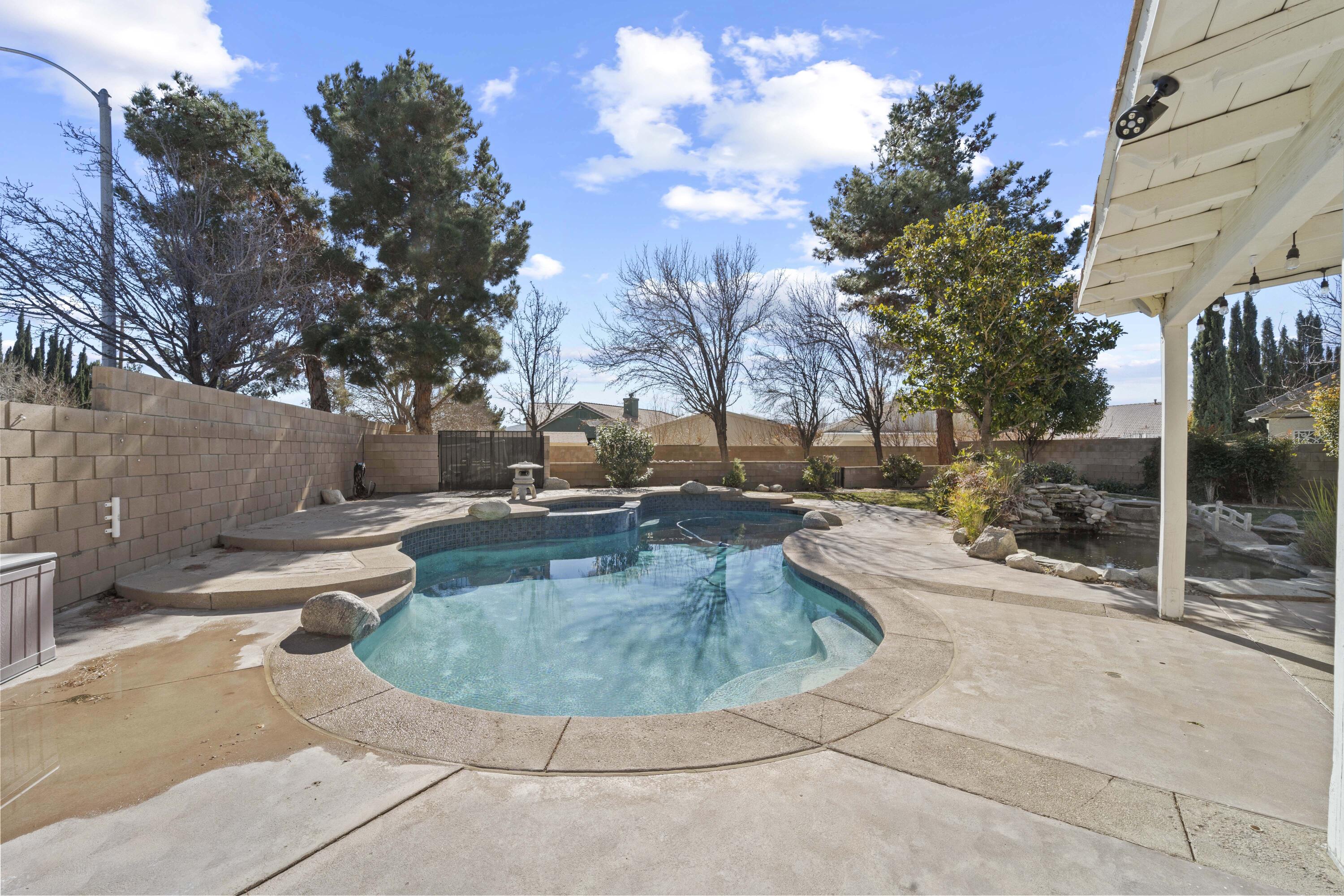 4008 Dee Dee Court Lancaster, CA 93536 - Photo 4 of 8 a view of a playground with a patio