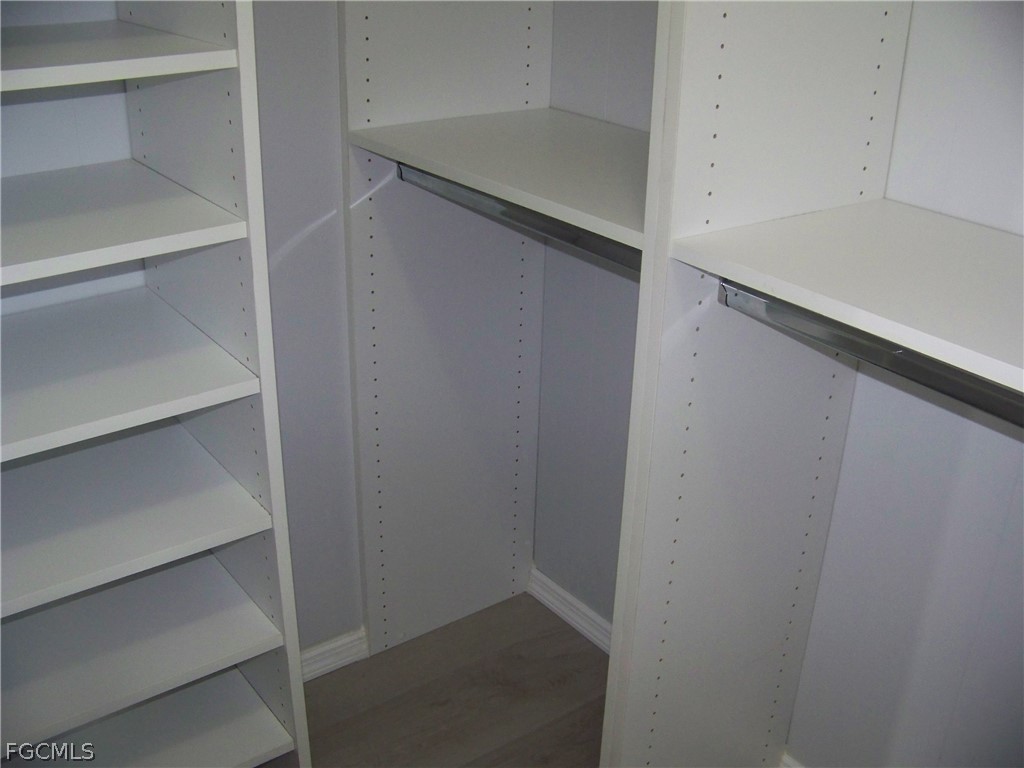 15550 Burnt Store Road, Unit 202 Punta Gorda, FL 33955 - Photo 34 of 50 a view of walk in closet