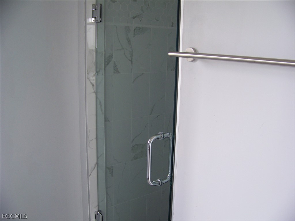 15550 Burnt Store Road, Unit 202 Punta Gorda, FL 33955 - Photo 38 of 50 a close view of shower tap