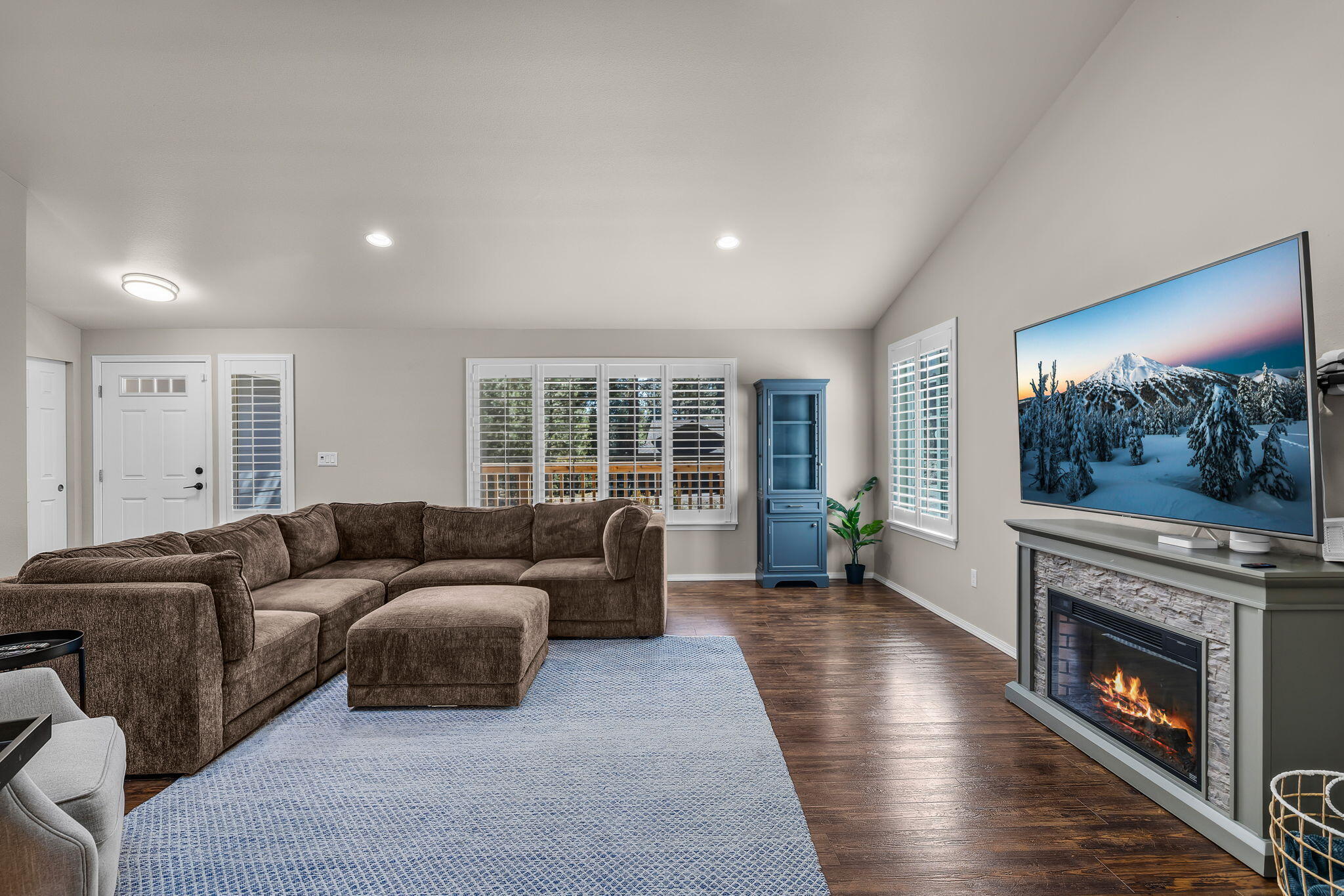 17064 Sacramento Road Bend, OR 97707 - Photo 1 of 50 a living room with furniture and a fireplace