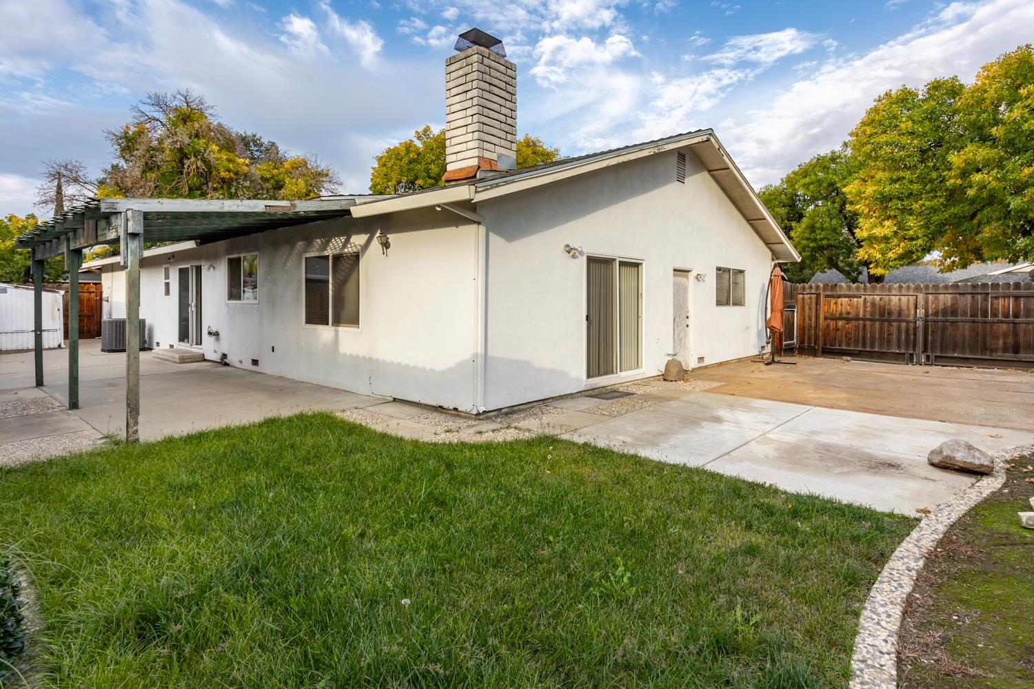 1505 Bandera Lane Modesto, CA 95355 - Photo 18 of 35 a view of a house with a yard