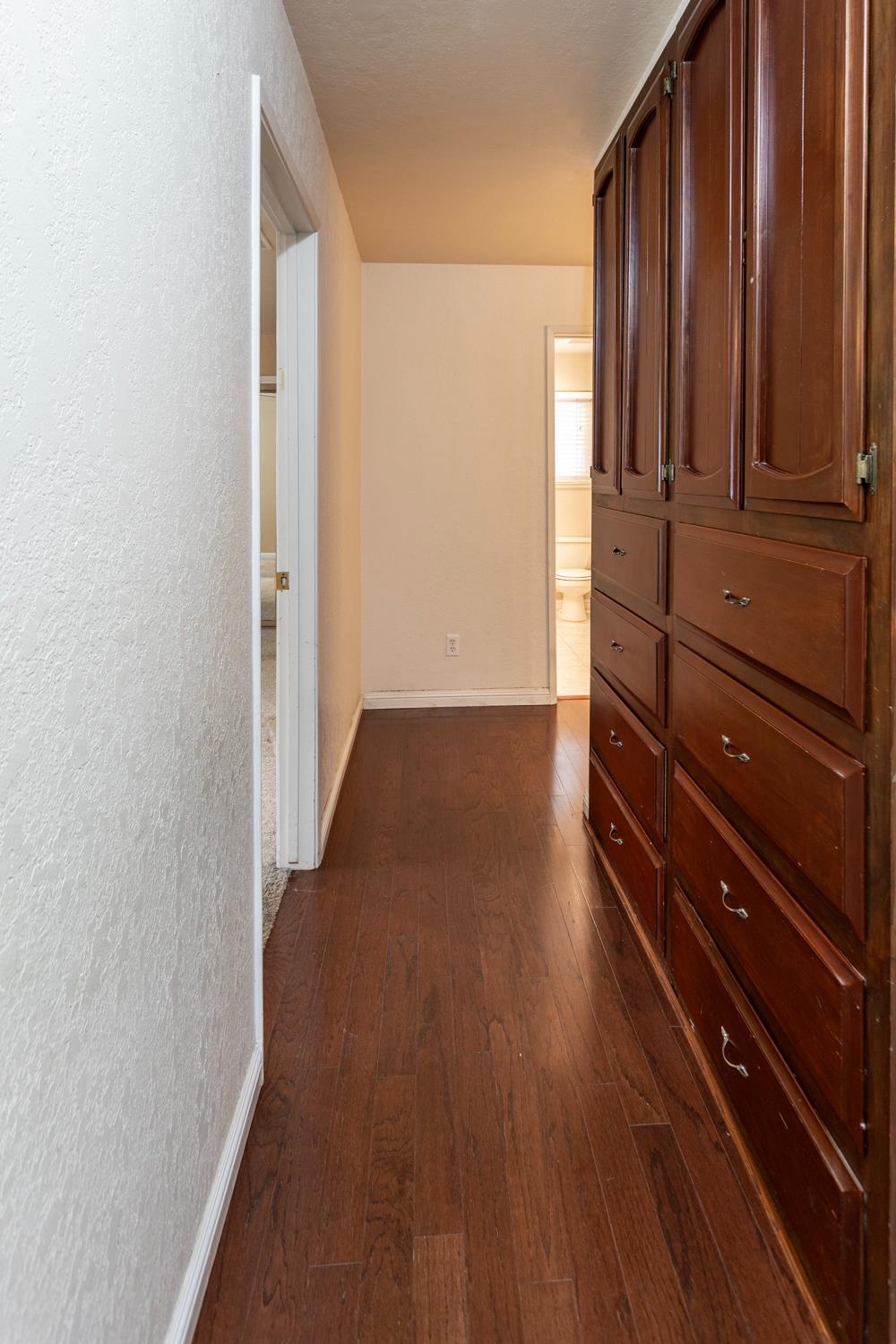 1505 Bandera Lane Modesto, CA 95355 - Photo 23 of 35 a view of a room with wooden floor