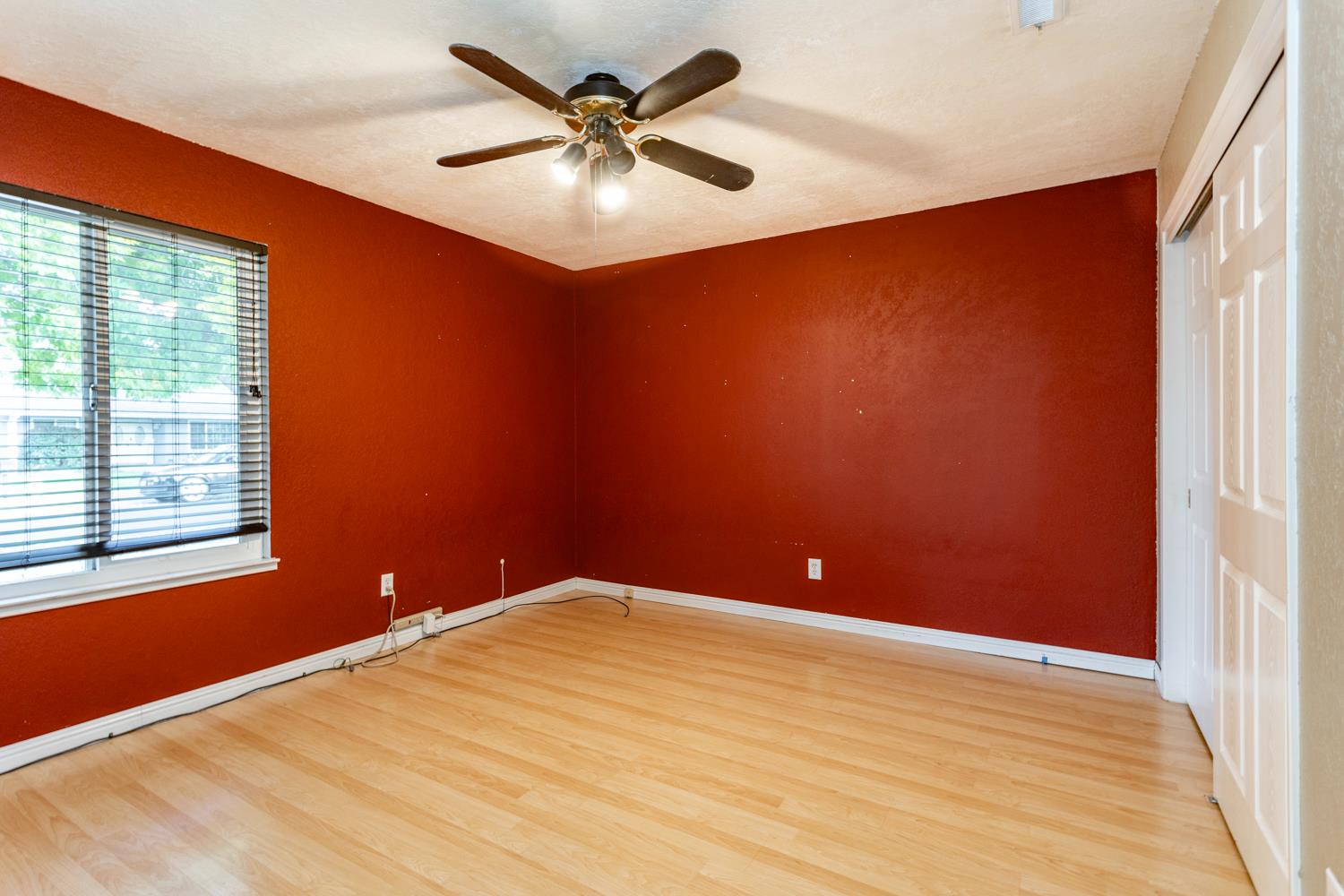 1505 Bandera Lane Modesto, CA 95355 - Photo 32 of 35 wooden floor in an empty room with a window