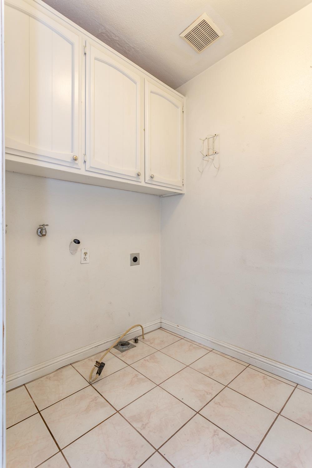 1505 Bandera Lane Modesto, CA 95355 - Photo 33 of 35 a view of white cabinets