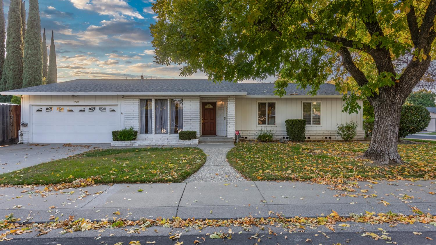 1505 Bandera Lane Modesto, CA 95355 - Photo 34 of 35 front view of house with a yard