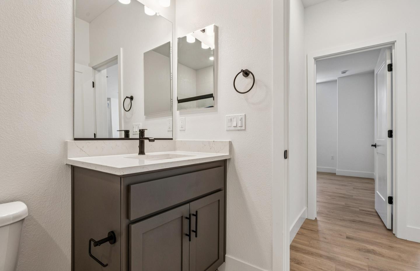 806 Redberry Way San Jose, CA 95117 - Photo 18 of 49 a bathroom with a sink and a mirror