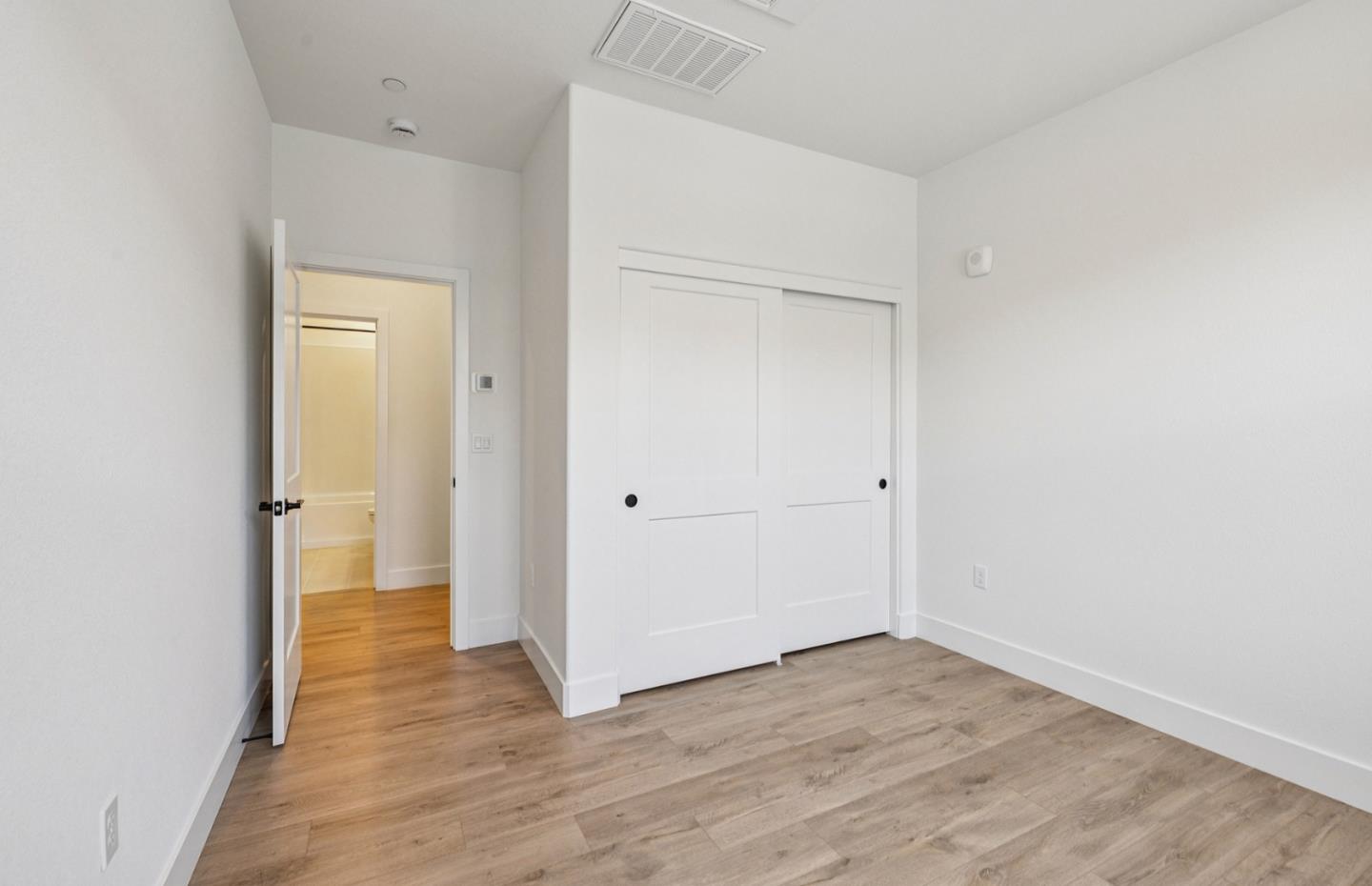 806 Redberry Way San Jose, CA 95117 - Photo 22 of 49 a view of a room with wooden floor