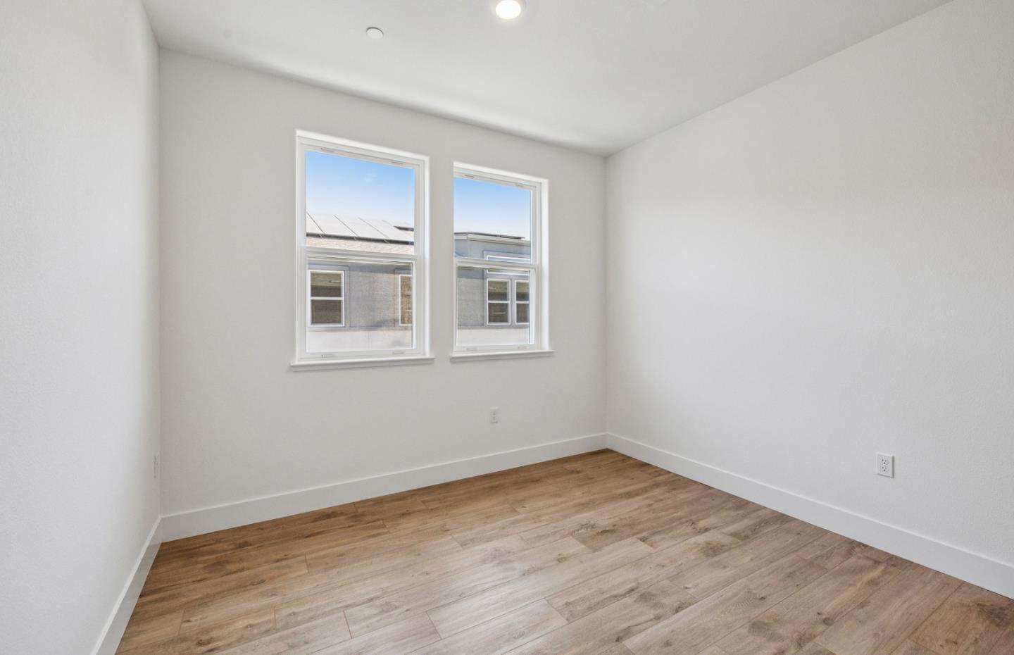 806 Redberry Way San Jose, CA 95117 - Photo 23 of 49 a view of empty room with wooden floor and fan