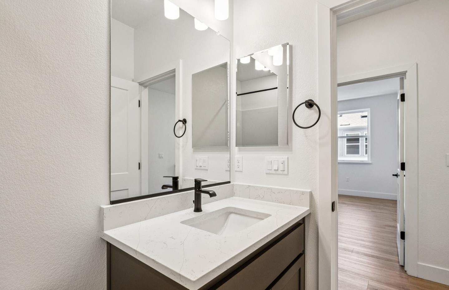 806 Redberry Way San Jose, CA 95117 - Photo 26 of 49 a bathroom with a sink and a mirror