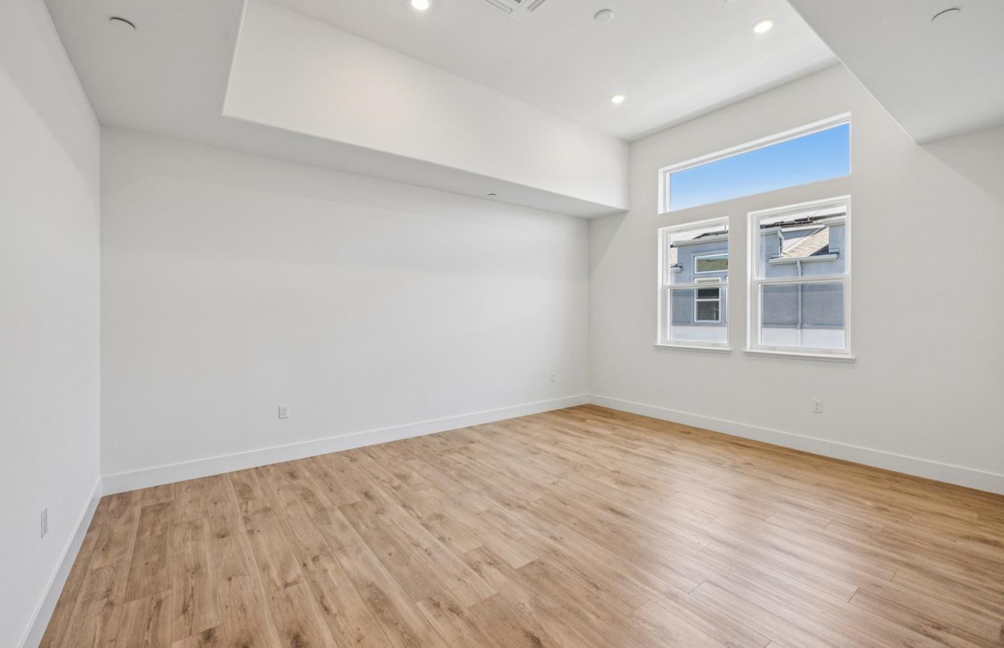 806 Redberry Way San Jose, CA 95117 - Photo 27 of 49 a view of empty room with wooden floor and fan