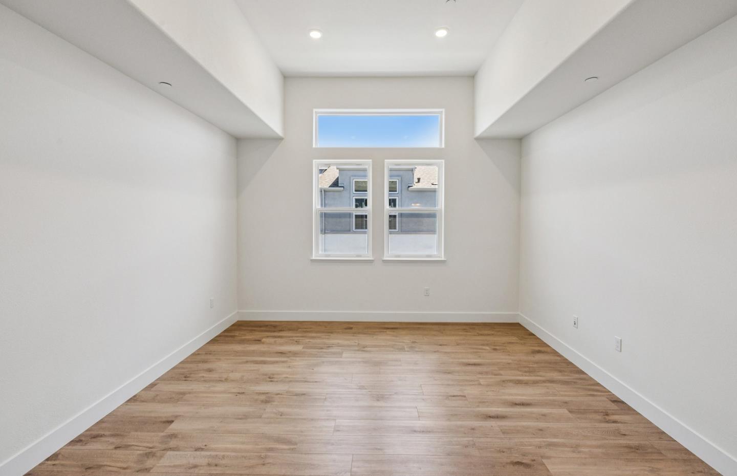 806 Redberry Way San Jose, CA 95117 - Photo 28 of 49 a view of empty room with wooden floor and fan