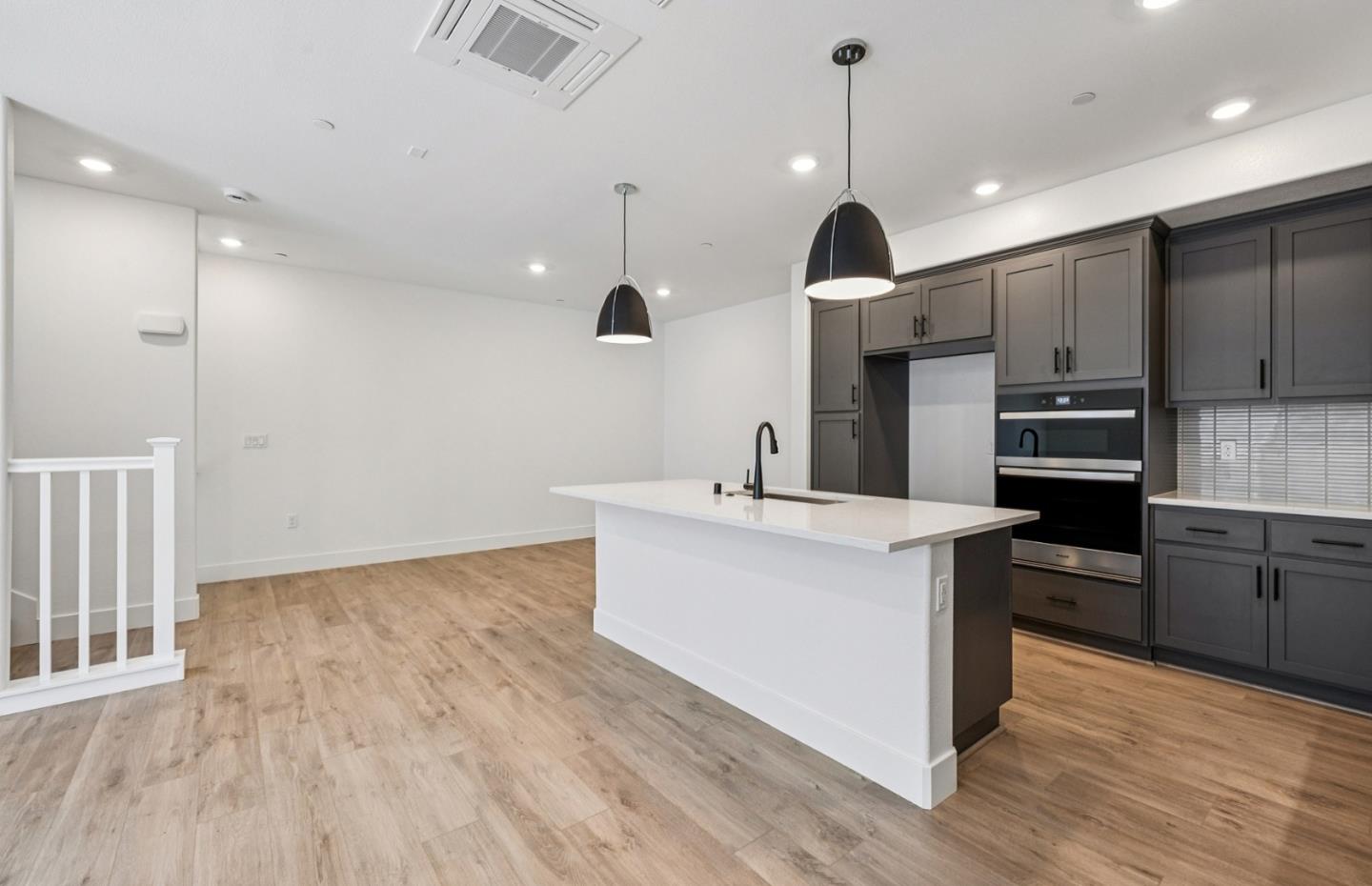 806 Redberry Way San Jose, CA 95117 - Photo 43 of 49 a kitchen with stainless steel appliances granite countertop a sink a stove and a refrigerator