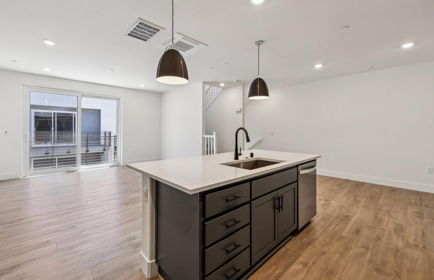 806 Redberry Way San Jose, CA 95117 - Photo 46 of 49 a kitchen with a sink cabinets and wooden floor