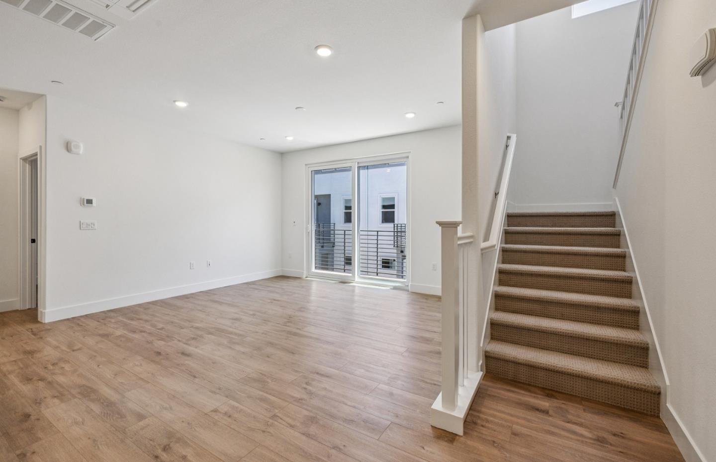 806 Redberry Way San Jose, CA 95117 - Photo 7 of 49 a view of entryway with wooden floor