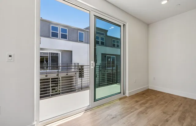 a view of a door and a window