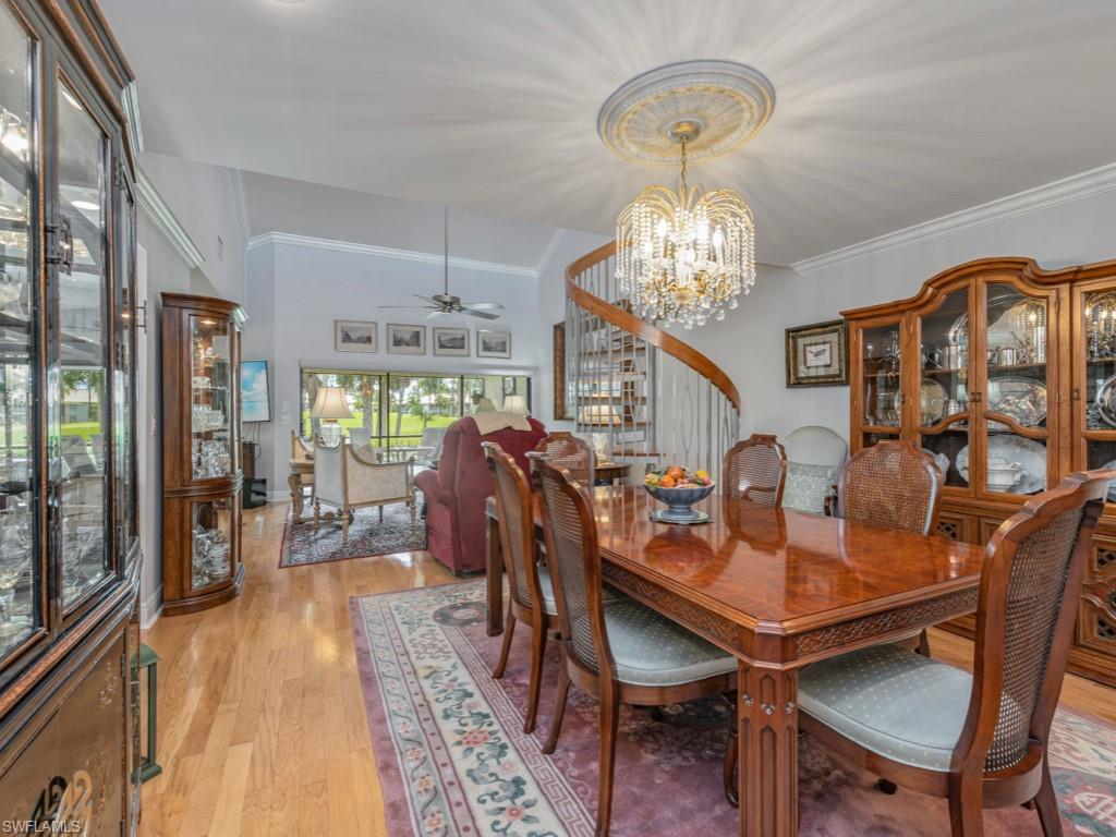 594 Augusta Boulevard, Unit 3 Naples, FL 34113 - Photo 6 of 20 a view of a dining room with furniture window and outside view