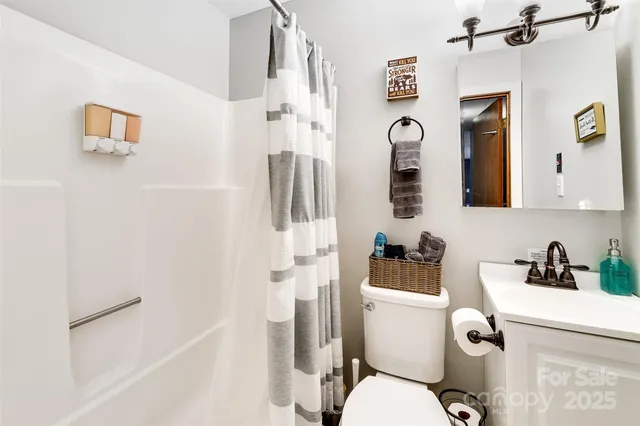 a view of a balcony with chairs