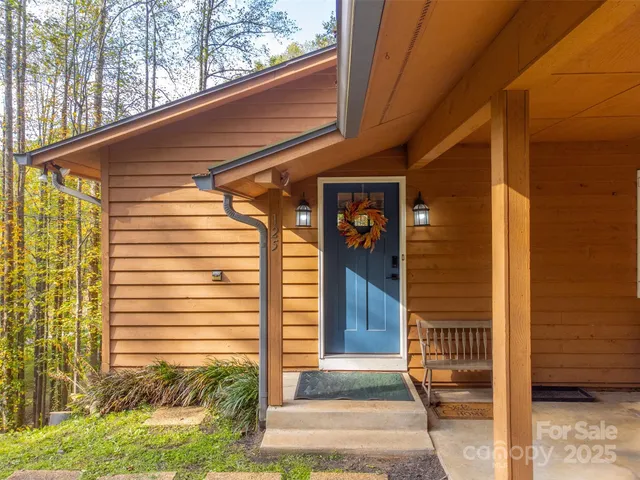a open kitchen with stainless steel appliances granite countertop a stove and refrigerator