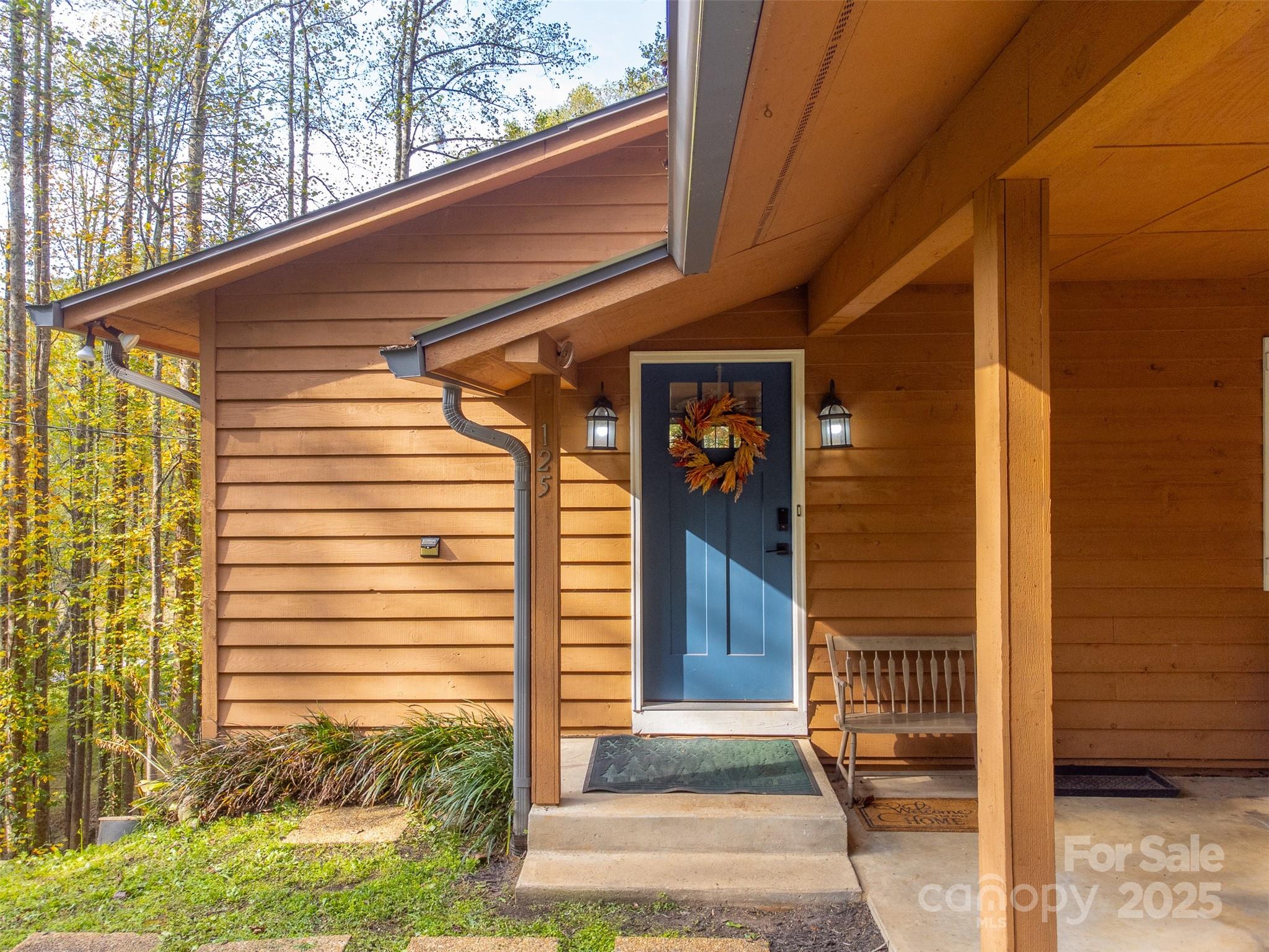 125 Nugget Lane Sylva, NC 28779 - Photo 7 of 30 a front view of a house with a yard