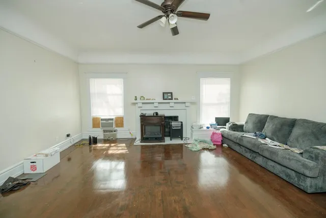 a bed room with a bed and a window