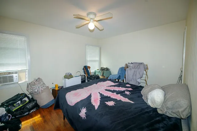 a bathroom with a sink and mirror with toilet