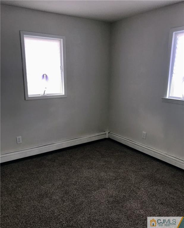 473 Harding Road Old Bridge, NJ 08879 - Photo 22 of 24 an empty room with a window