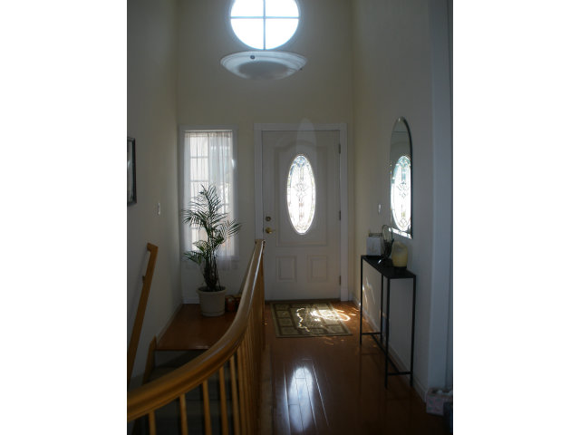 61 Ralston Ranch Road Belmont, CA 94002 - Photo 11 of 13 a view of a hallway with windows