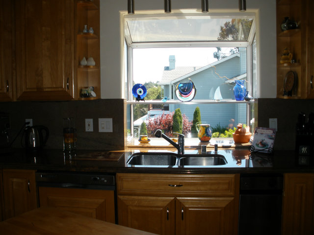 61 Ralston Ranch Road Belmont, CA 94002 - Photo 8 of 13 a kitchen with a sink and a stove top oven