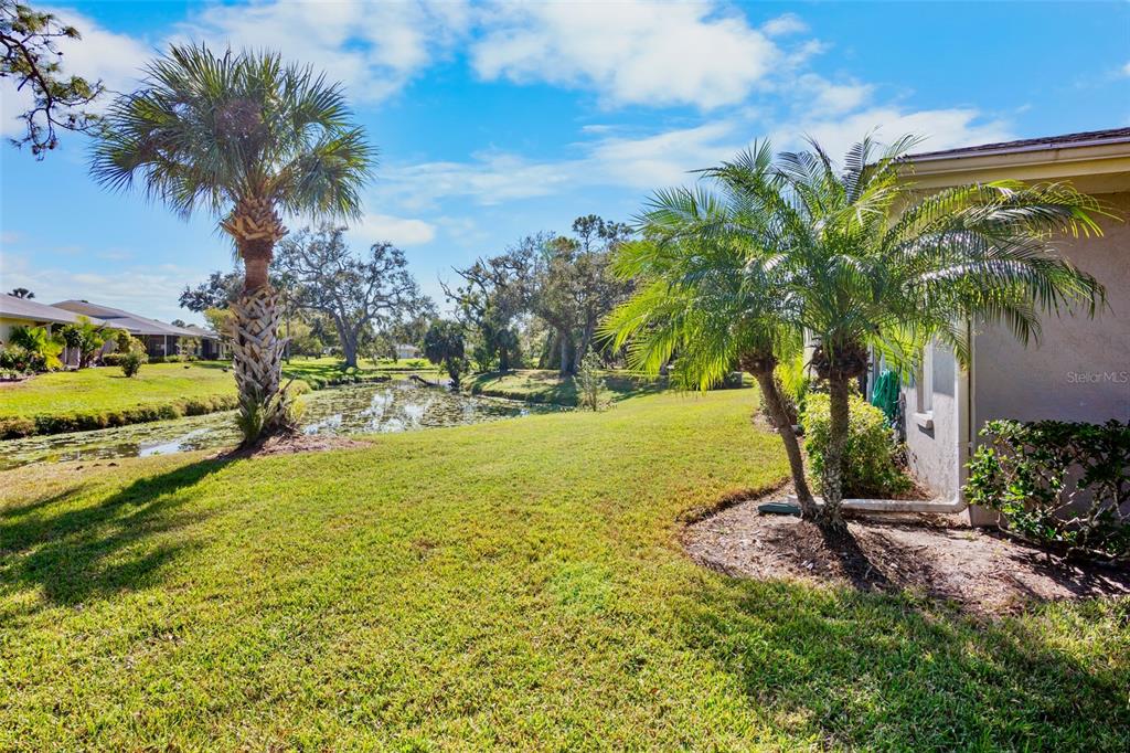 3905 Center Gate Circle, Unit 3 Sarasota, FL 34233 - Photo 19 of 20 a view of a backyard