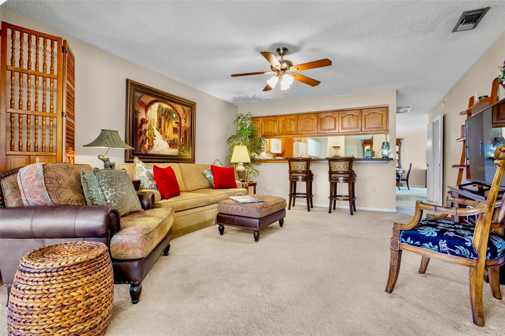 3905 Center Gate Circle, Unit 3 Sarasota, FL 34233 - Photo 8 of 20 a living room with furniture and a window