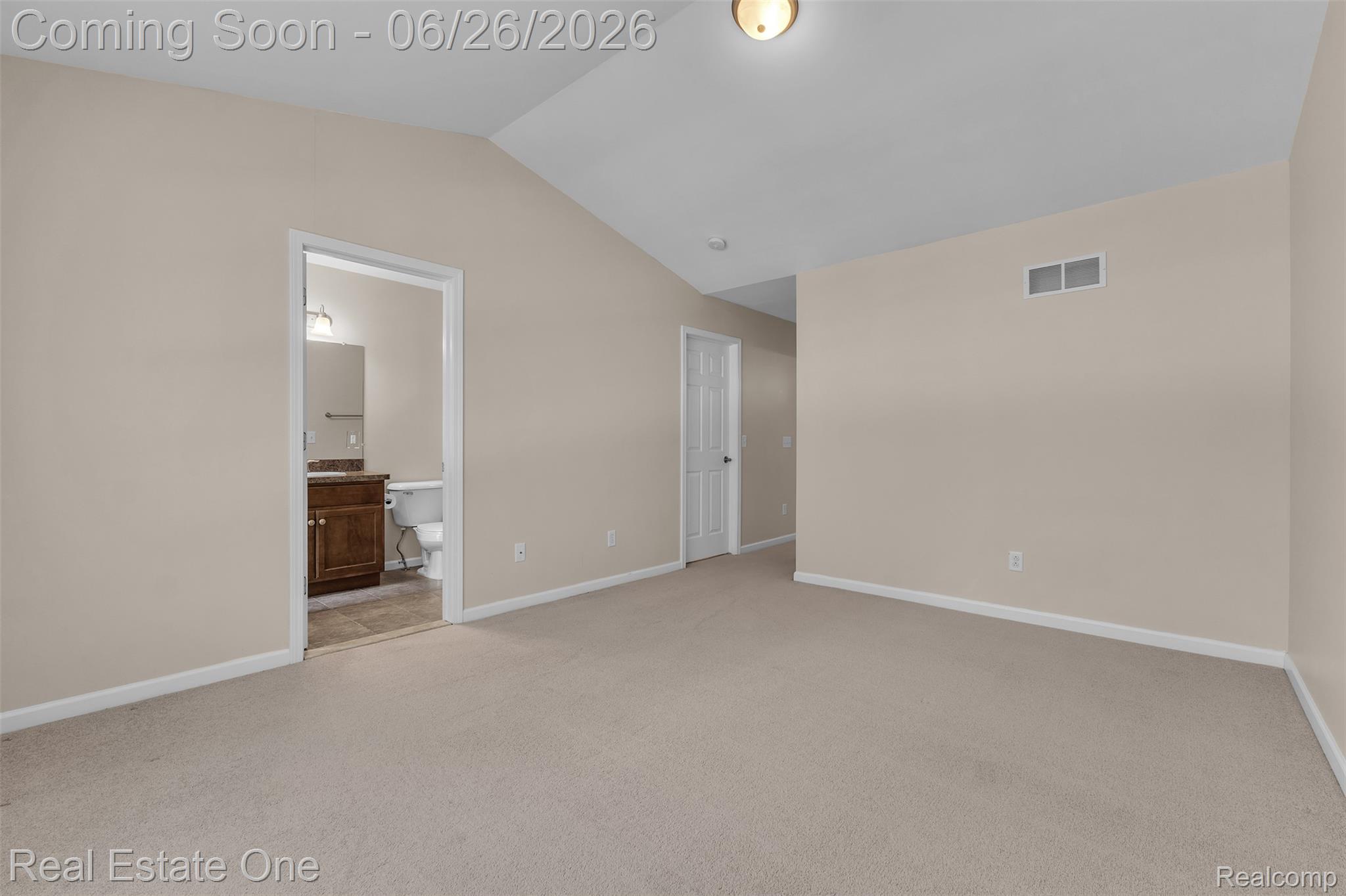 41590 Mitchell Road Novi, MI 48377 - Photo 31 of 45 Spacious room featuring vaulted ceilings and neutral carpeting