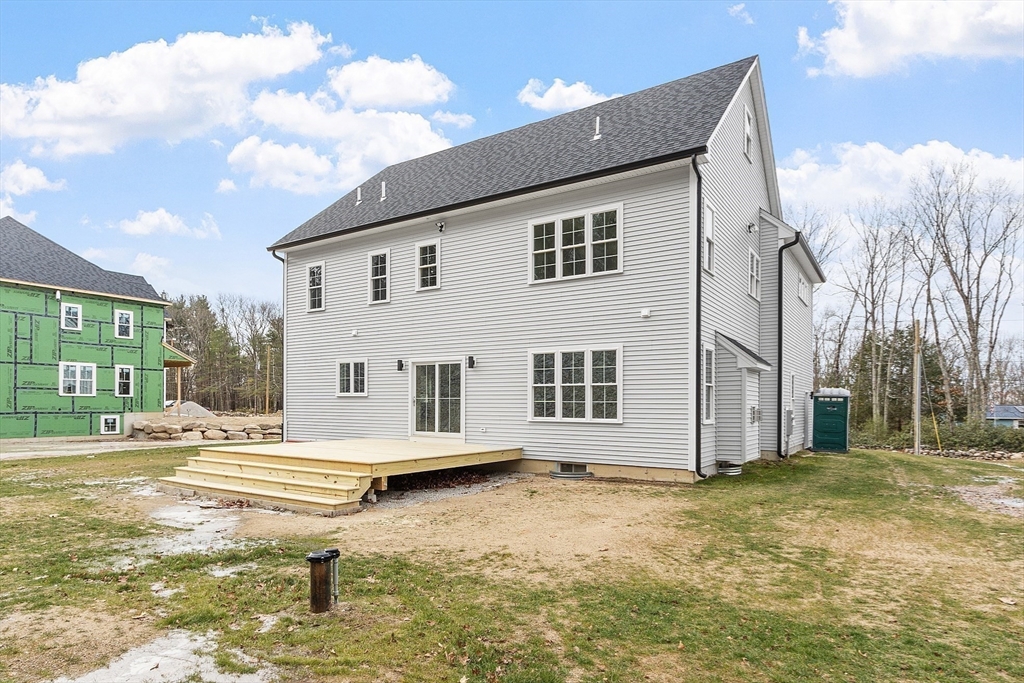 171 Upper Gore Road Webster, MA 01570 - Photo 41 of 42 a house view with a backyard space