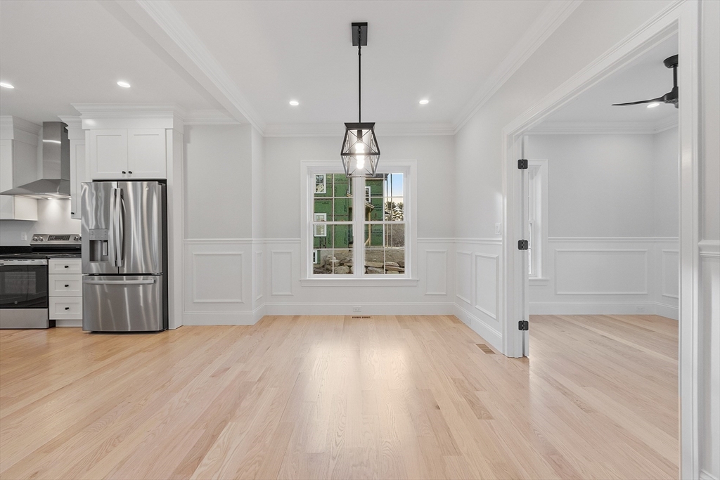 171 Upper Gore Road Webster, MA 01570 - Photo 5 of 42 a view of wooden floor and windows in a room